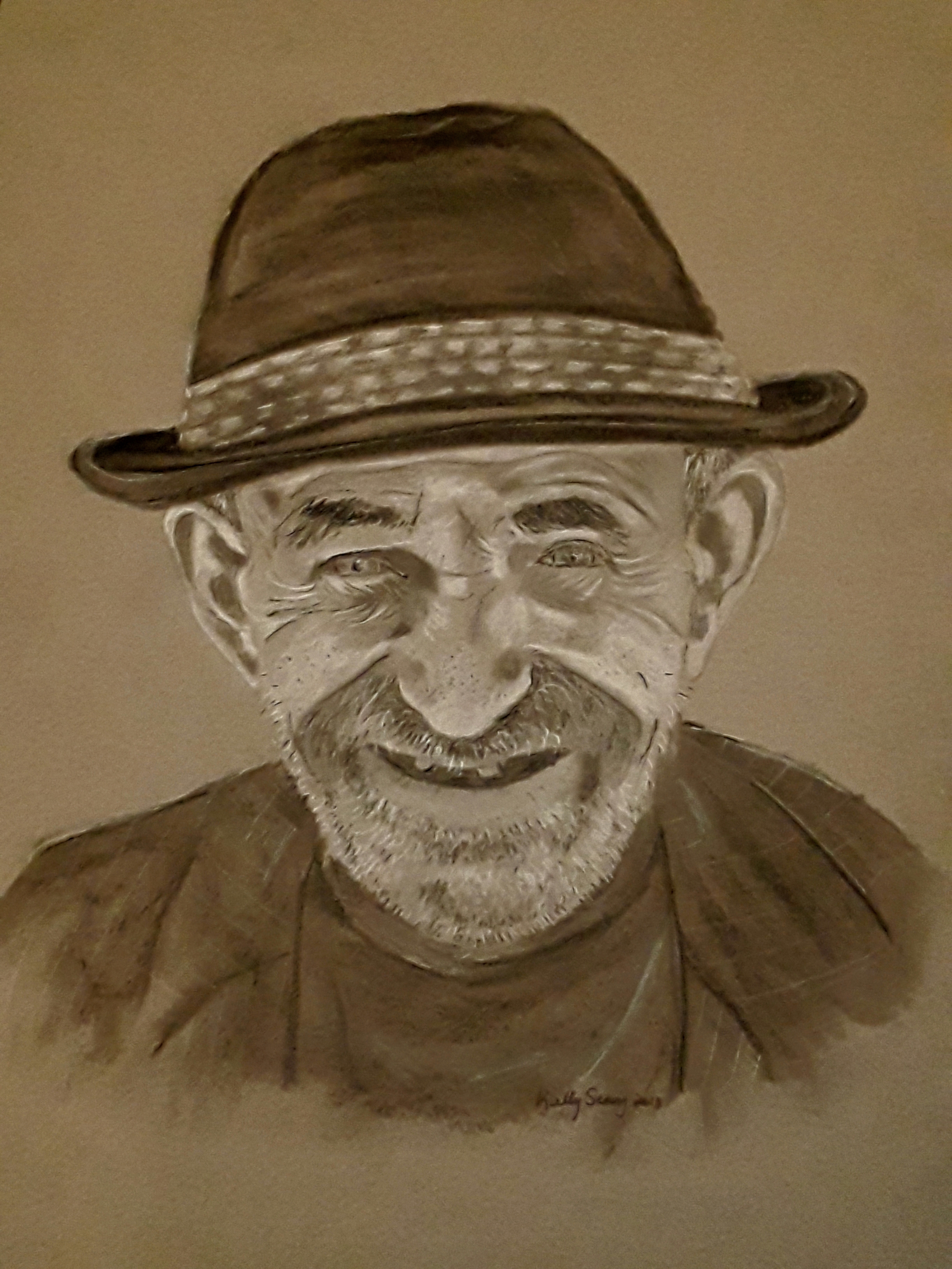 smiling old man drawing