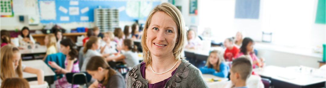 teacher in a classroom with children