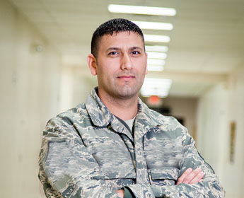 Rick P. dressed in military fatigues