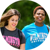 two students walking on campus