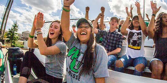 Group of WilmU students in bleachers.