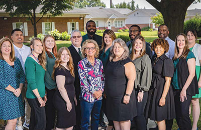 Staff together on campus