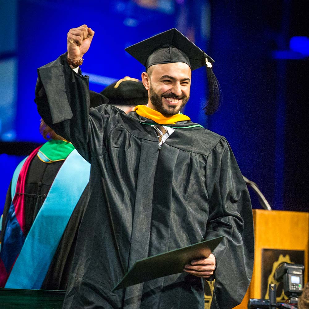 a picture of a student receiving their diploma