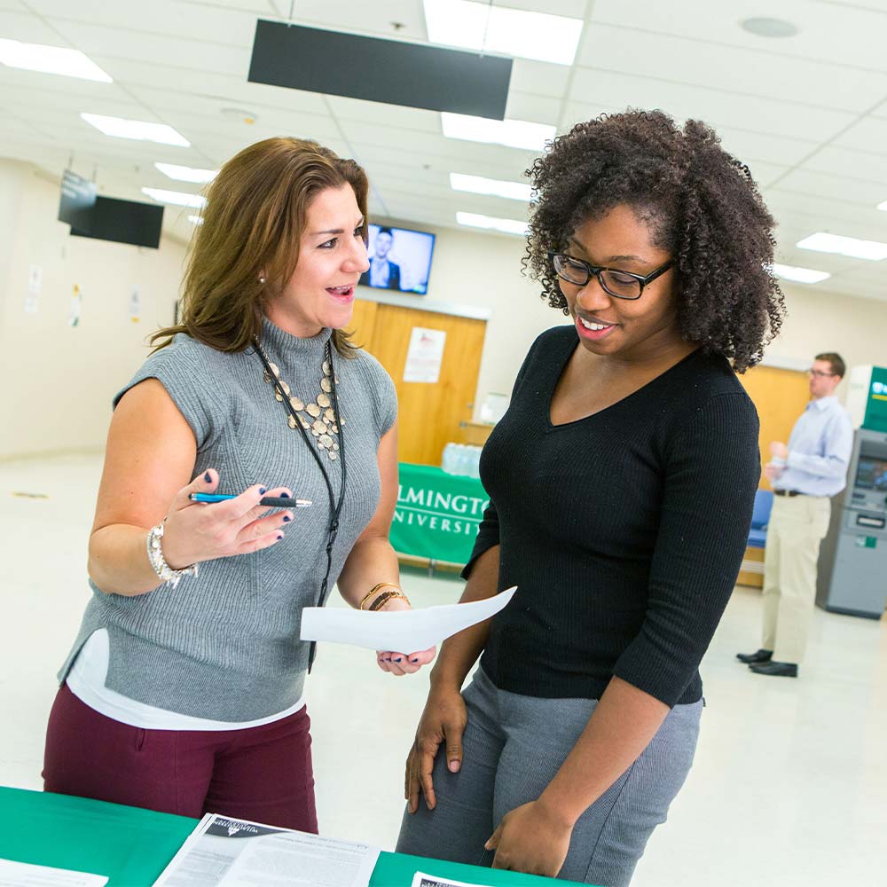 picture of a counselor working with a studet